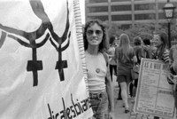 Barbara Bjanes with Radicalesbians banner